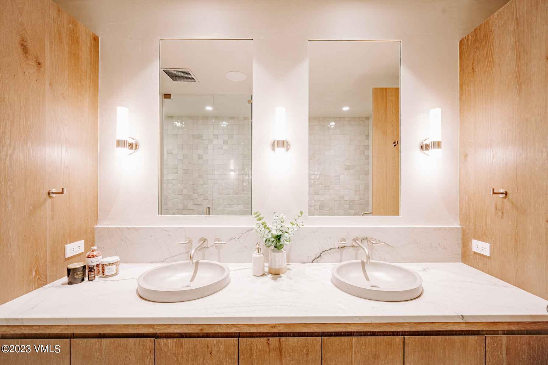 1033 Homestake Circle Vail, CO 81657 - Photo 26 of 30 a bathroom with a sink and a mirror