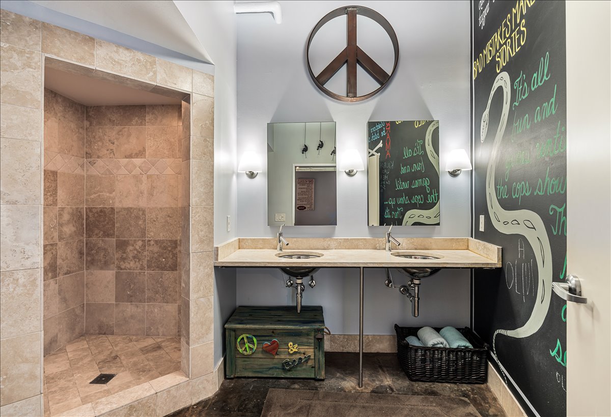 311 West 5th Street, Unit 703 Austin, TX 78701 - Photo 22 of 30 a bathroom with a sink and a mirror