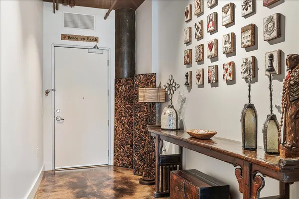 a room with a table and chairs
