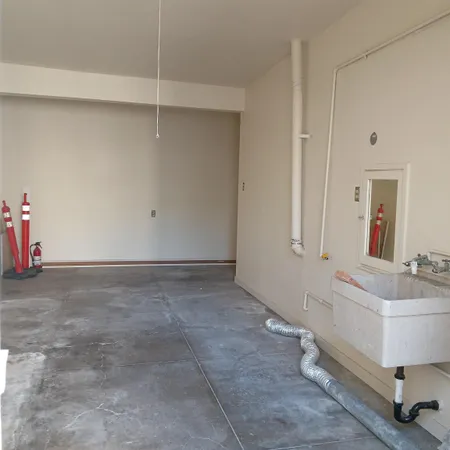 a room with a table and chairs