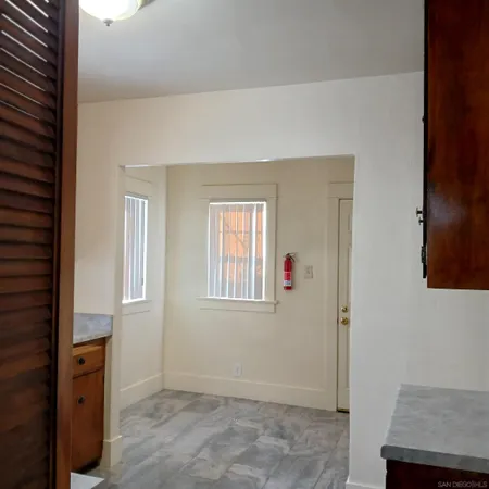an empty room with windows