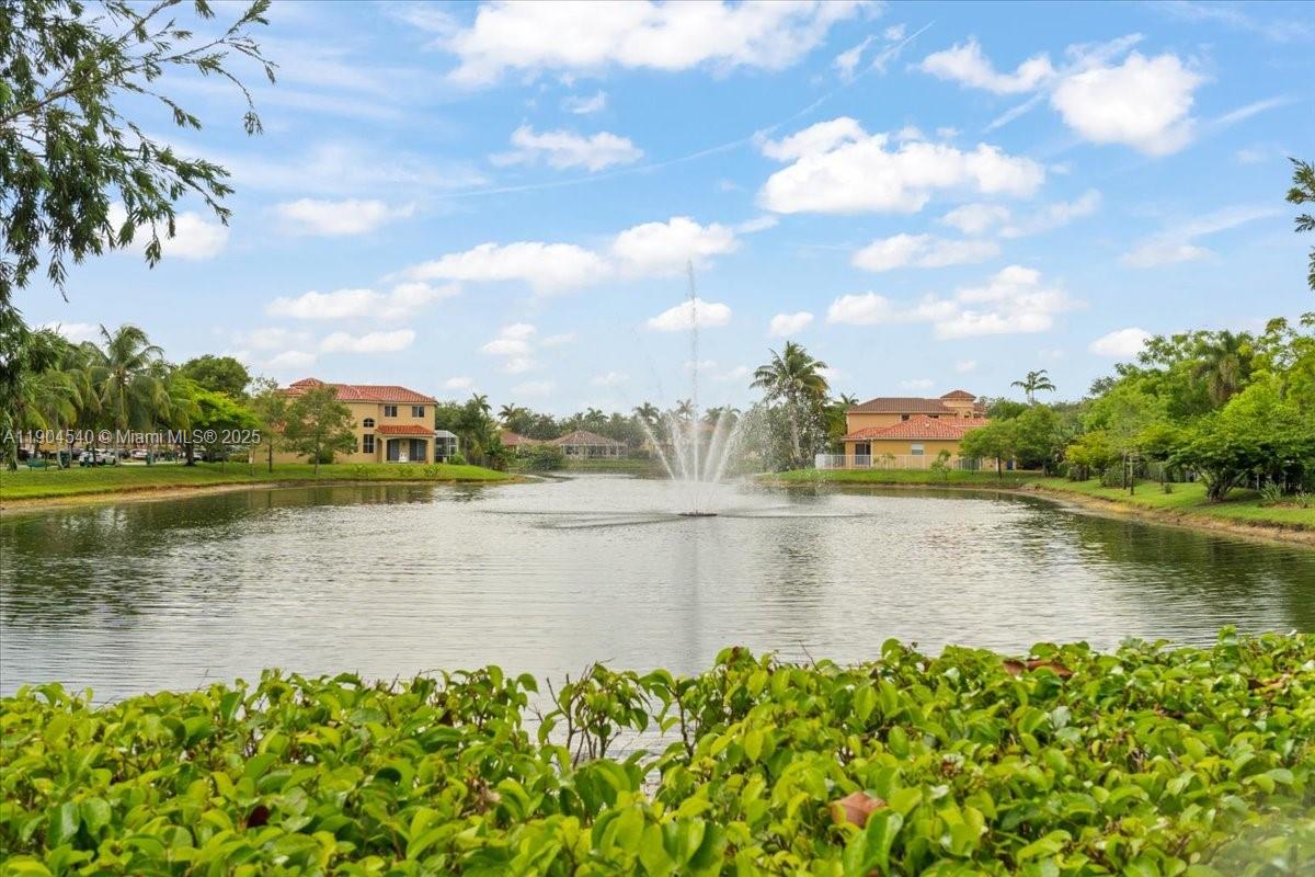 12720 Southwest 49th Court Miramar, FL 33027 - Photo 24 of 26 a view of a lake with a city