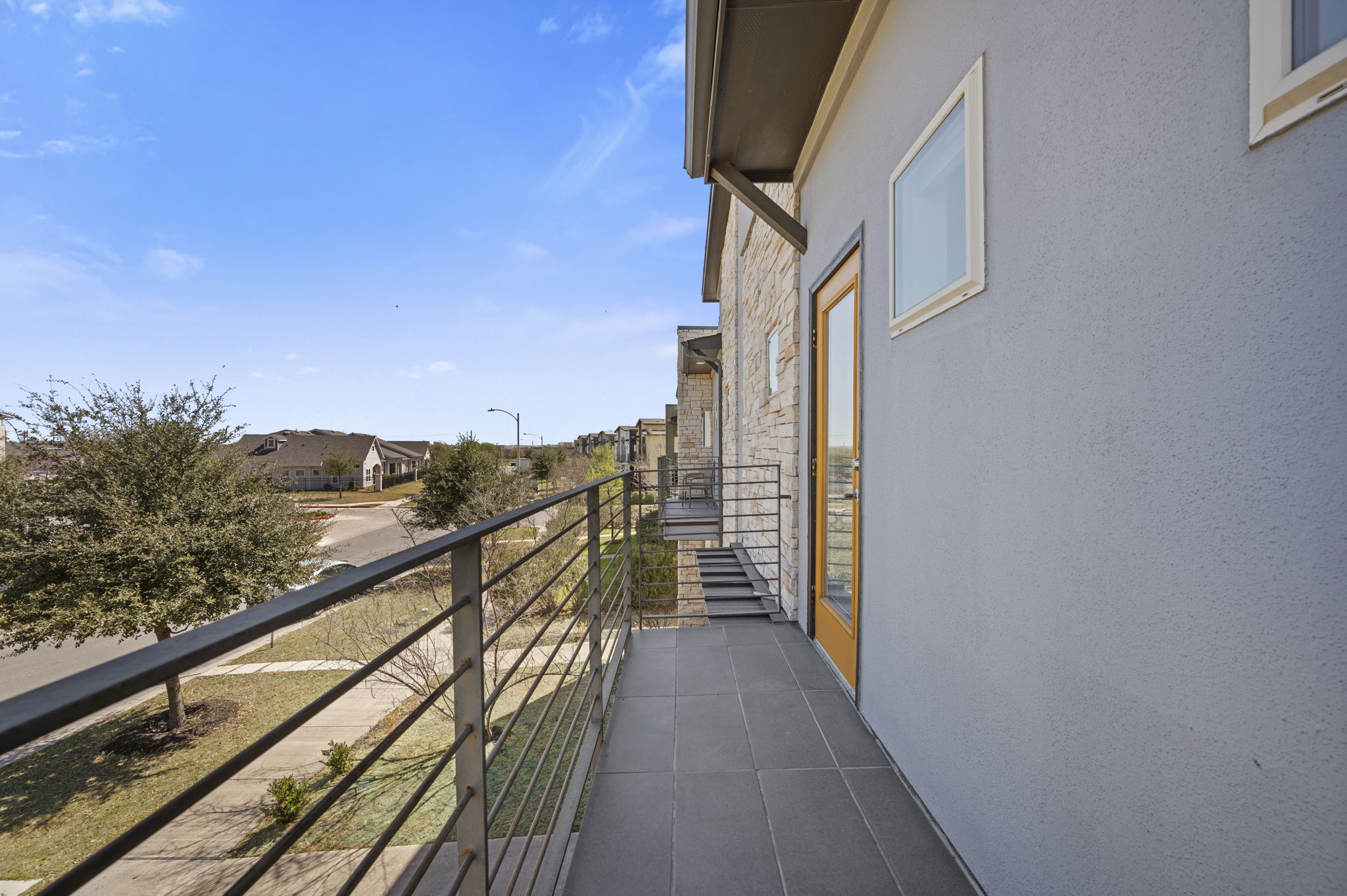 5809 Charles Merle Dr., Unit B Austin, TX 78747 - Photo 11 of 27 View of balcony