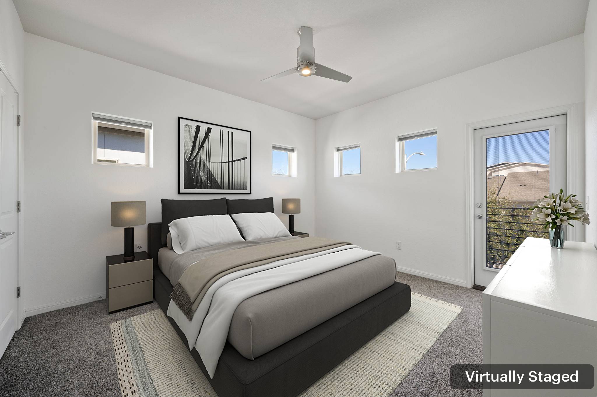 5809 Charles Merle Dr., Unit B Austin, TX 78747 - Photo 10 of 27 Bedroom with baseboards, light colored carpet, a ceiling fan, and access to outside