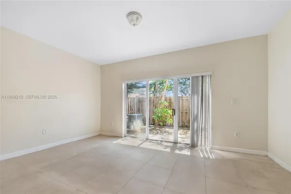 an empty room with outdoor space