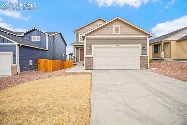 a view of front of house with garage