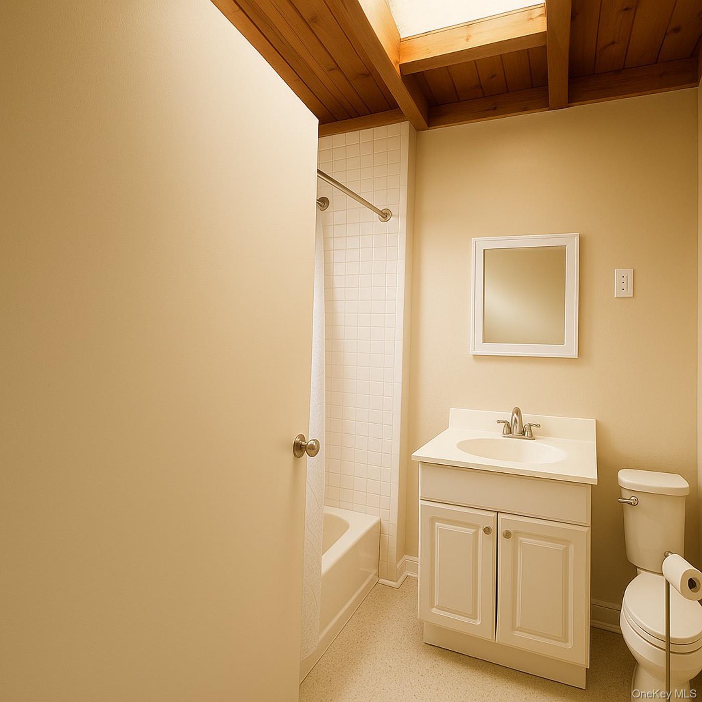 34 Maple Street Islip, NY 11751 - Photo 7 of 10 Full bath featuring vanity, a wood ceiling with exposed beams, and shower / bath combination with curtain