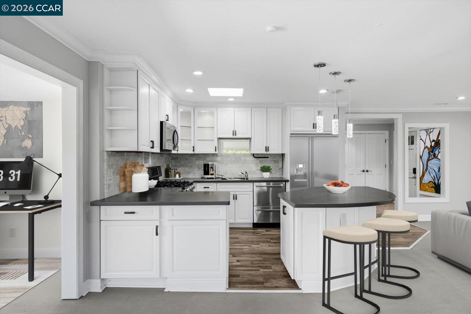 2741 Golden Rain Road, Unit 7 Walnut Creek, CA 94595 - Photo 12 of 60 a kitchen with white cabinets and appliances