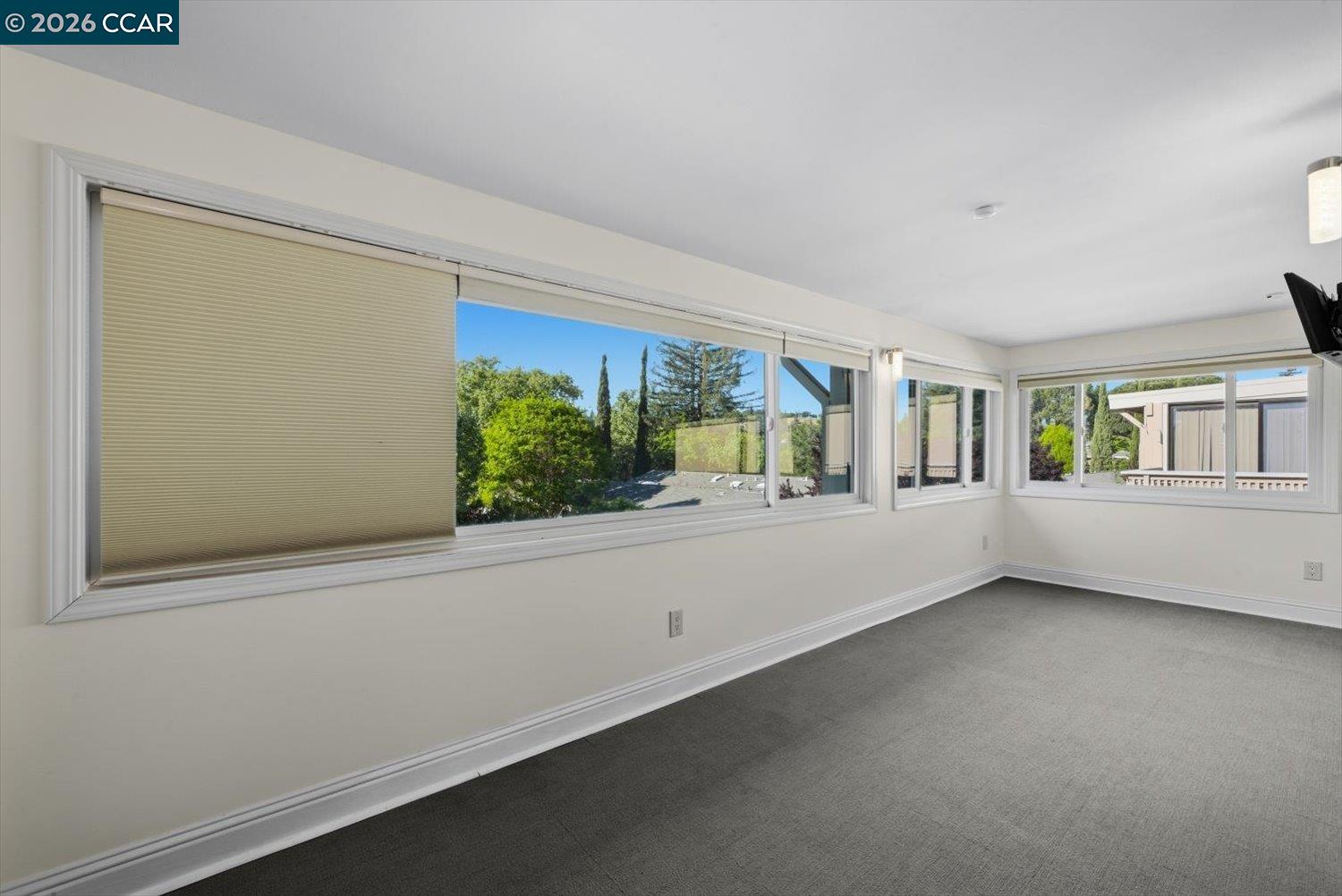 2741 Golden Rain Road, Unit 7 Walnut Creek, CA 94595 - Photo 23 of 60 a view of an empty room with a window