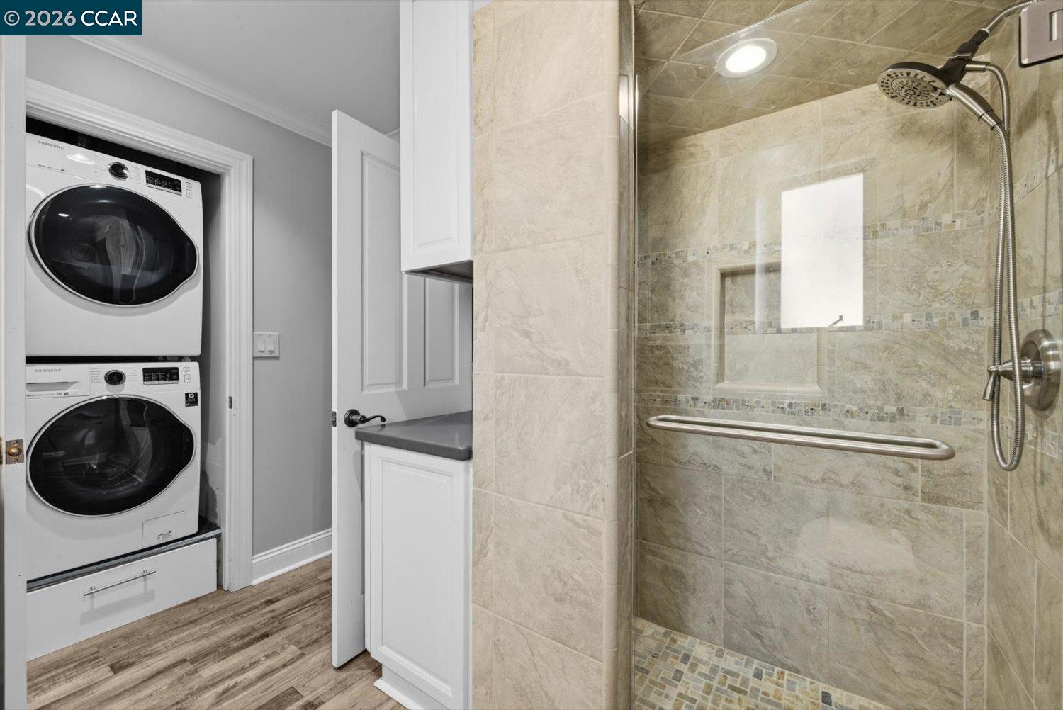 2741 Golden Rain Road, Unit 7 Walnut Creek, CA 94595 - Photo 34 of 60 a view of a bathroom with washer and dryer