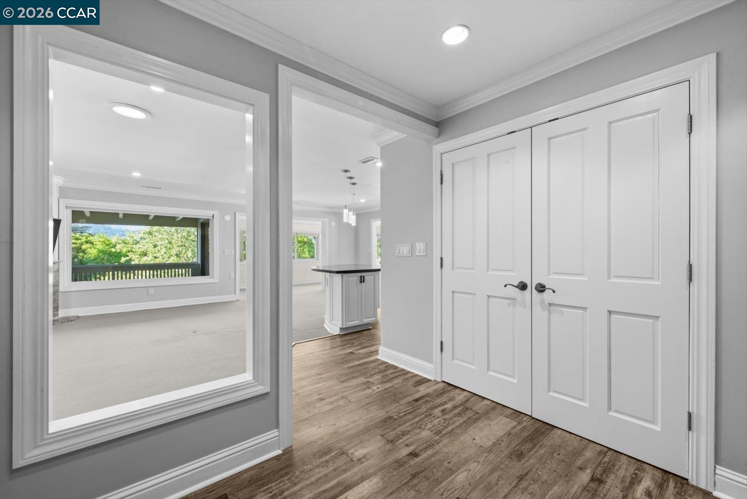 2741 Golden Rain Road, Unit 7 Walnut Creek, CA 94595 - Photo 39 of 60 a view of a hallway with wooden floor