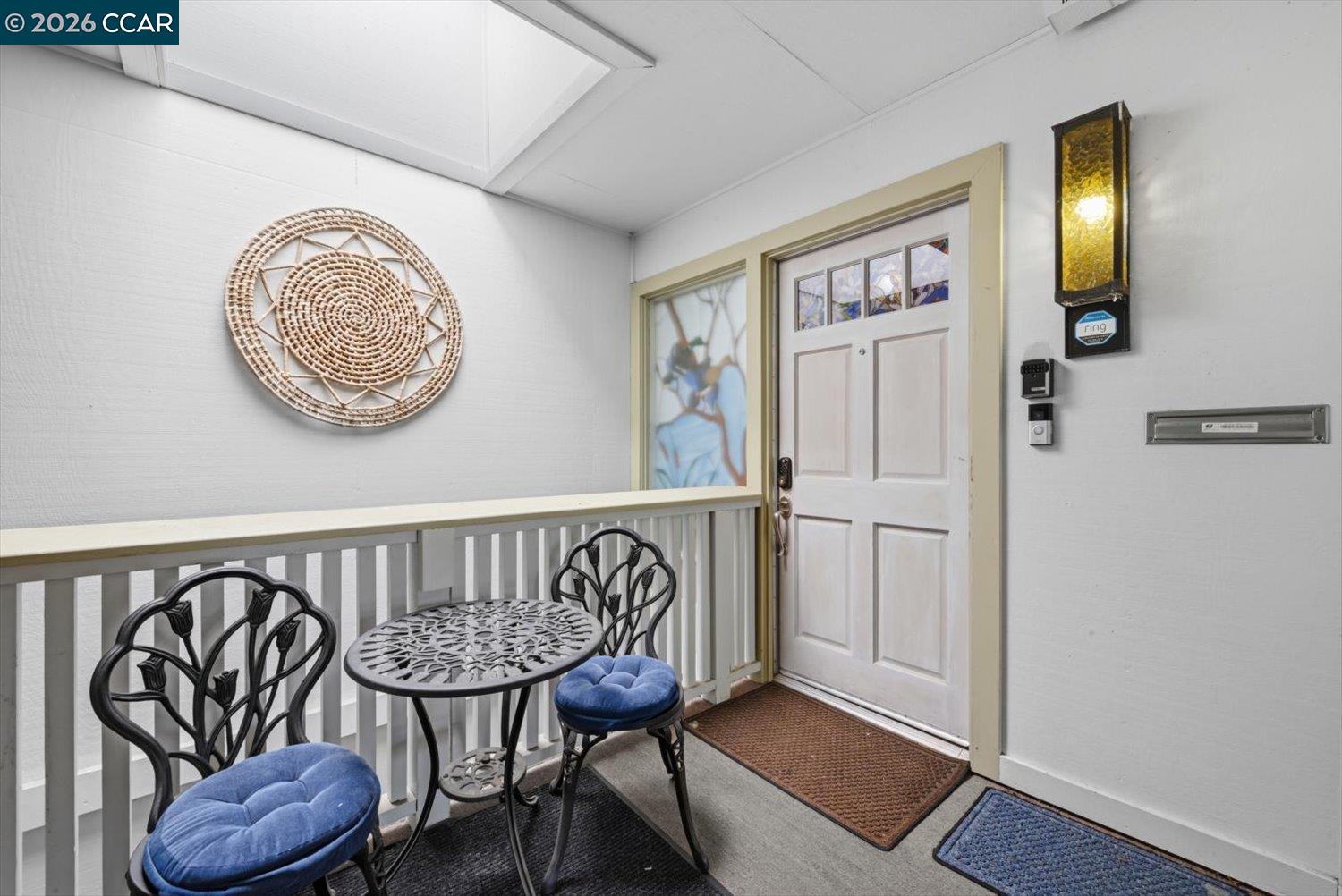 2741 Golden Rain Road, Unit 7 Walnut Creek, CA 94595 - Photo 4 of 60 a view of a hallway with wooden floor and windows