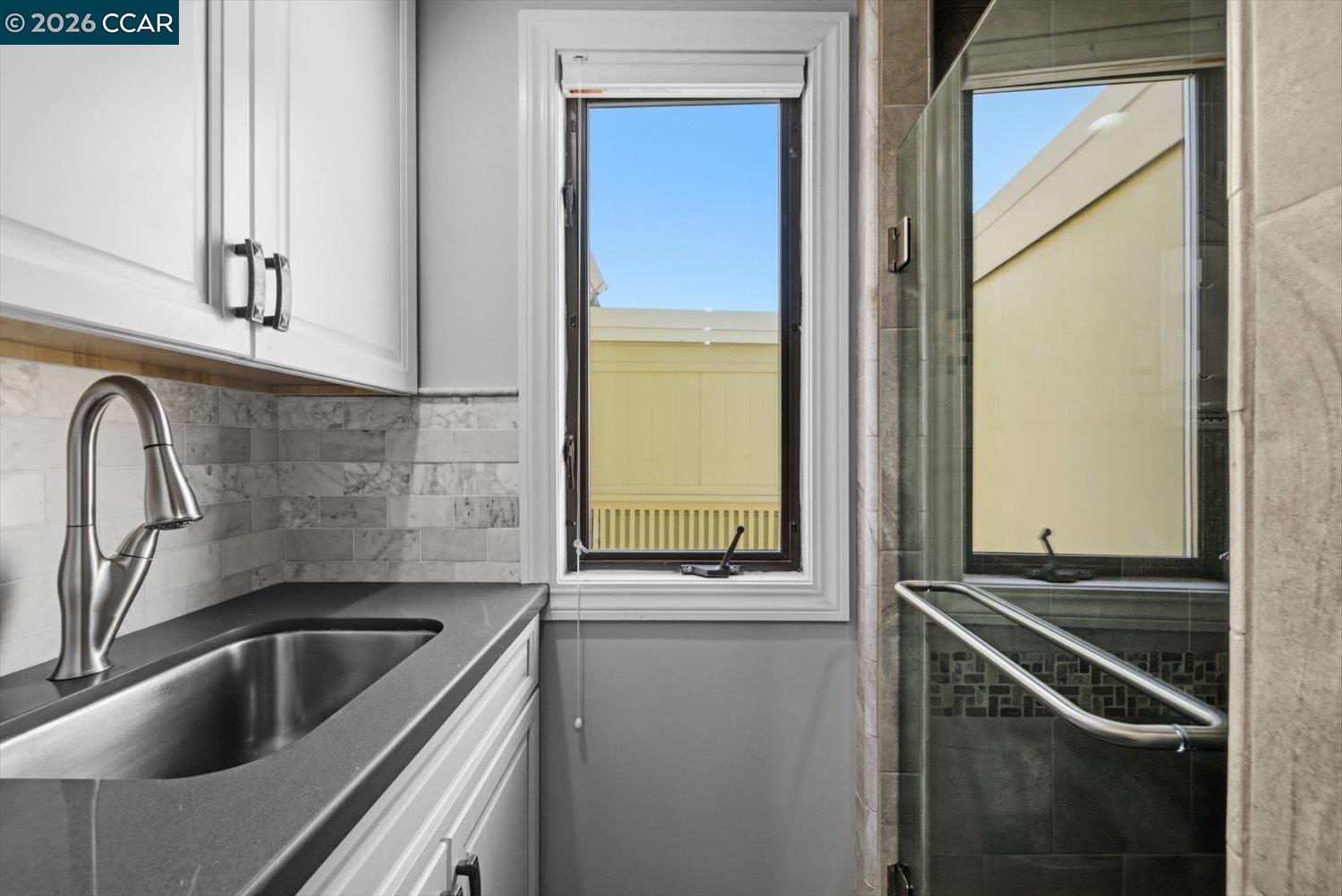 2741 Golden Rain Road, Unit 7 Walnut Creek, CA 94595 - Photo 44 of 60 a kitchen with a sink and a refrigerator