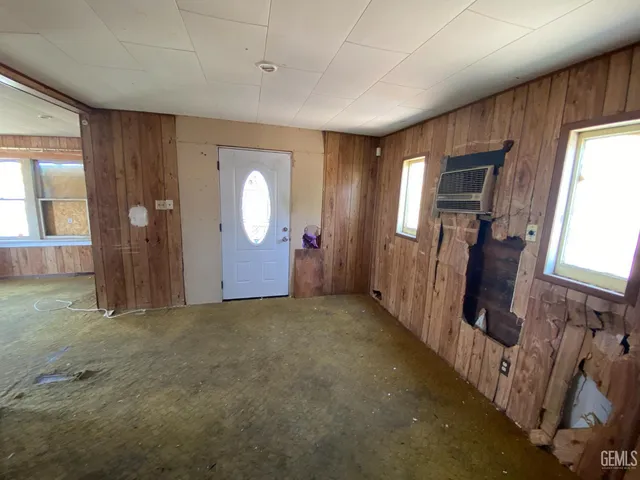 a view of empty room with windows