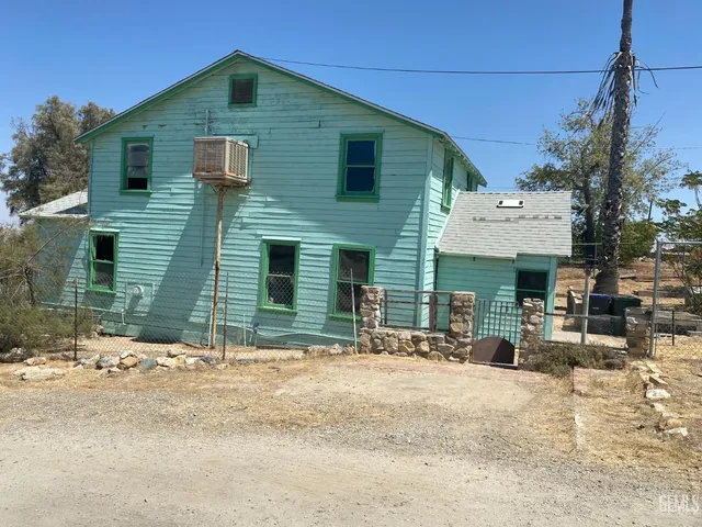 a view of a house with a patio