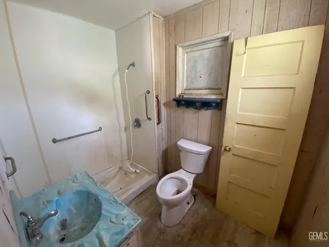 a view of a kitchen with a sink and a window