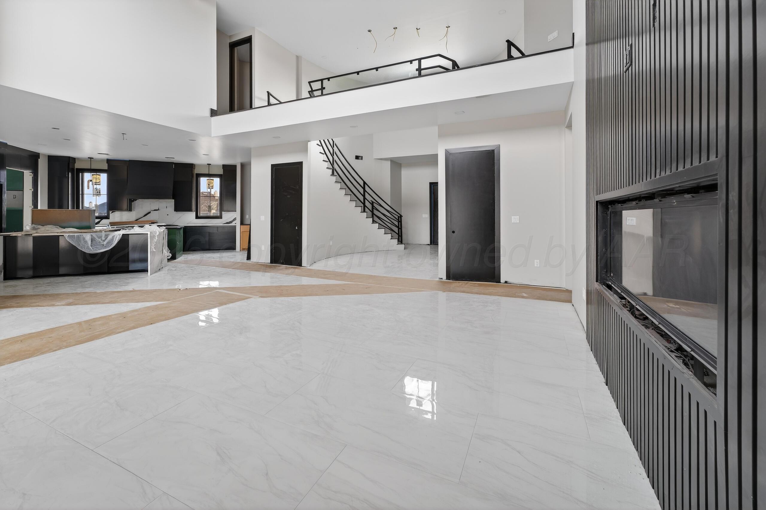 5602 Boyce Court Amarillo, TX 79119 - Photo 11 of 17 a view of a livingroom with furniture and staircase
