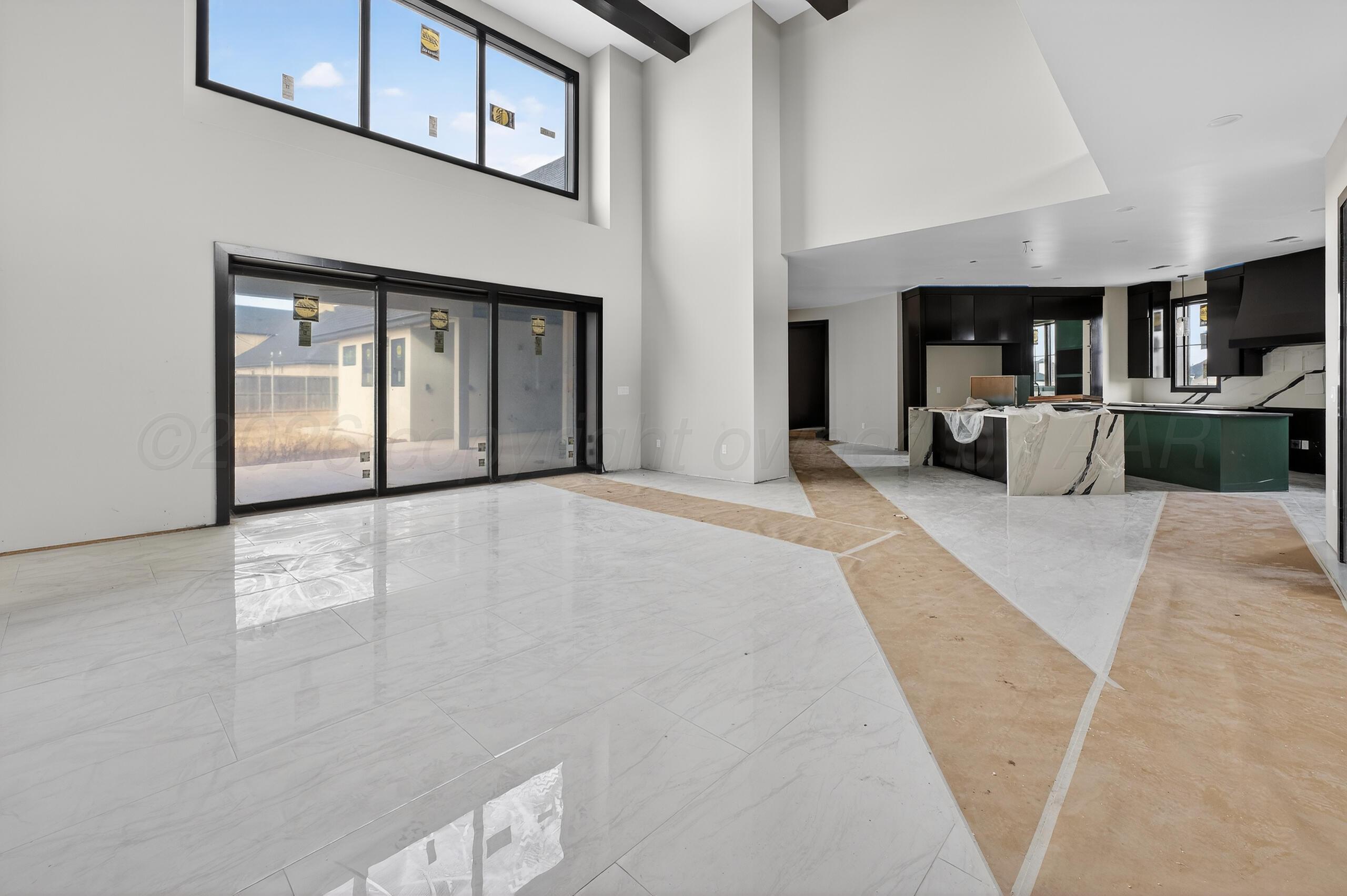 5602 Boyce Court Amarillo, TX 79119 - Photo 13 of 17 a view of livingroom with furniture and windows