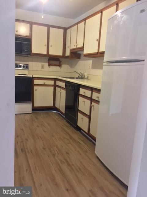 4100 Chardel Road, Unit 1D Baltimore, MD 21236 - Photo 7 of 22 Kitchen with New Flooring