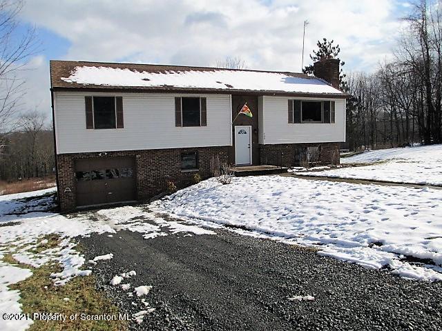 a front view of house with pathway
