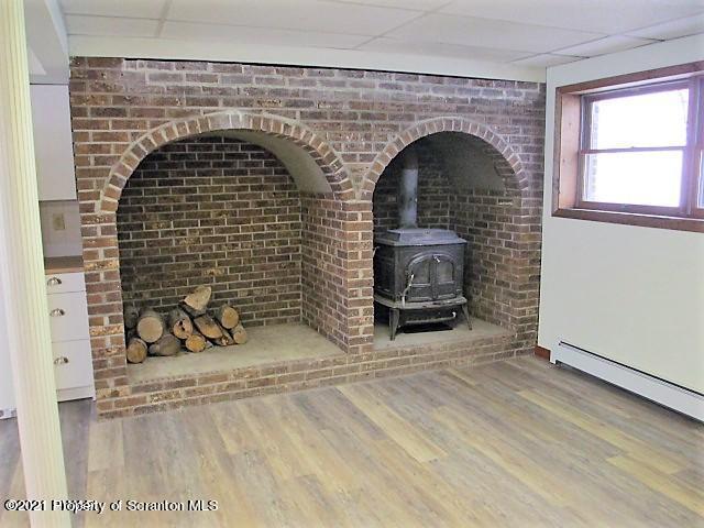 700 Stock Farm Road Lake Ariel, PA 18436 - Photo 11 of 37 a living room with fireplace