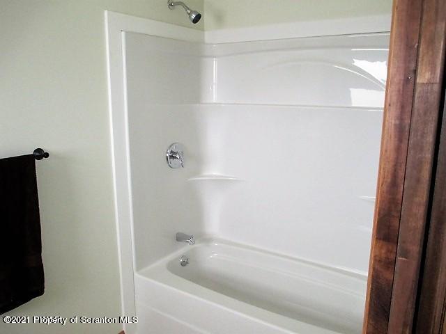 700 Stock Farm Road Lake Ariel, PA 18436 - Photo 15 of 37 a bathroom with a bathtub