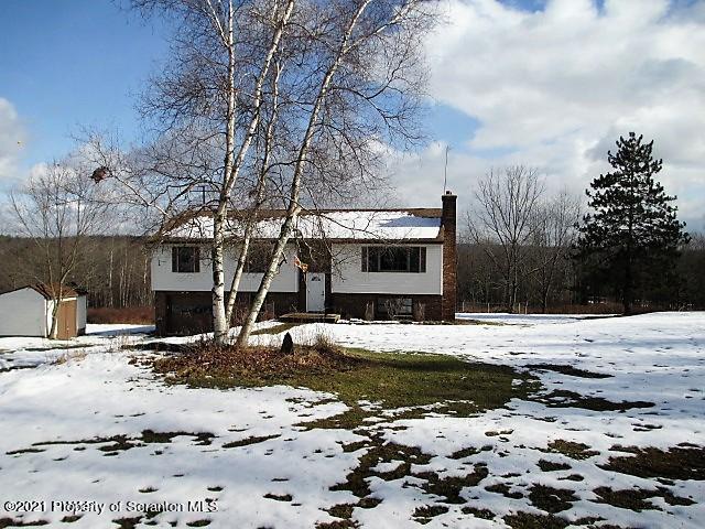 700 Stock Farm Road Lake Ariel, PA 18436 - Photo 2 of 37 a front view of a house with a yard