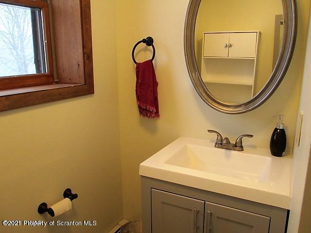 700 Stock Farm Road Lake Ariel, PA 18436 - Photo 21 of 37 a bathroom with a sink and a mirror