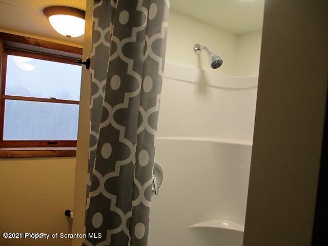 700 Stock Farm Road Lake Ariel, PA 18436 - Photo 22 of 37 a bathroom with a shower