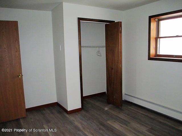 700 Stock Farm Road Lake Ariel, PA 18436 - Photo 25 of 37 a view of an empty room with wooden floor and a window