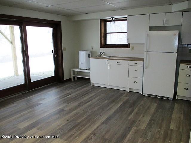 700 Stock Farm Road Lake Ariel, PA 18436 - Photo 26 of 37 a kitchen with a refrigerator and window