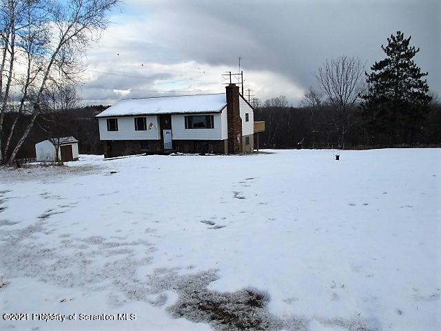 700 Stock Farm Road Lake Ariel, PA 18436 - Photo 32 of 37 a front view of a house with a yard