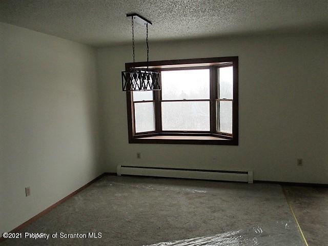 700 Stock Farm Road Lake Ariel, PA 18436 - Photo 6 of 37 a view of an empty room with a window