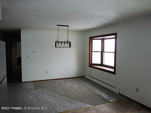 700 Stock Farm Road Lake Ariel, PA 18436 - Photo 7 of 37 an empty room with windows