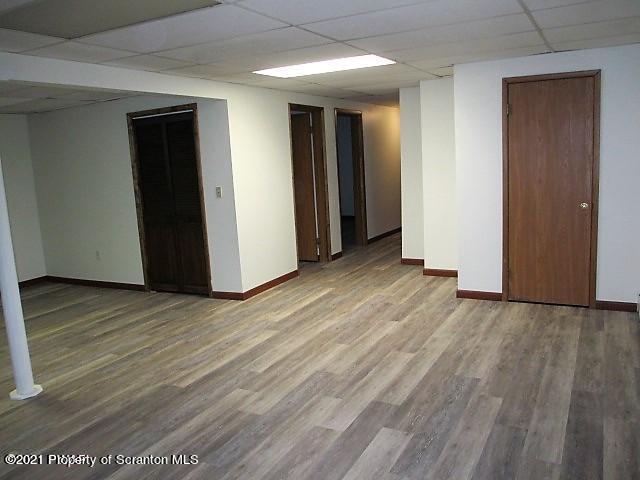 700 Stock Farm Road Lake Ariel, PA 18436 - Photo 10 of 37 an empty room with wooden floor & closet area
