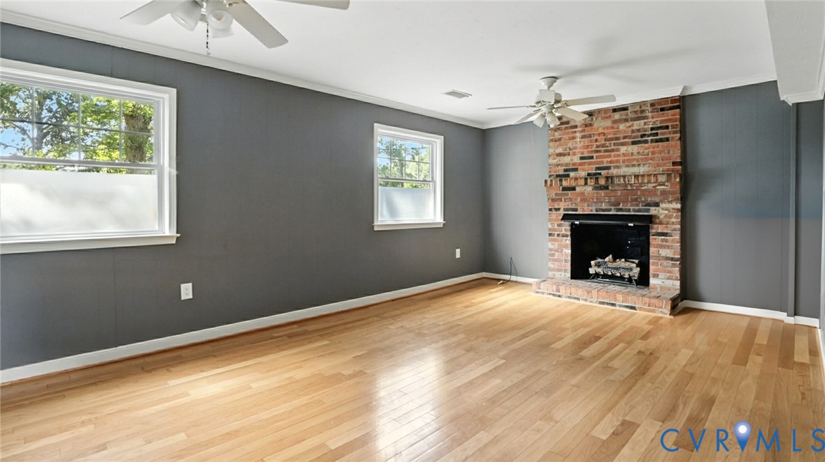 2425 Boissevain Road Henrico, VA 23229 - Photo 17 of 37 Unfurnished living room featuring ornamental moldi