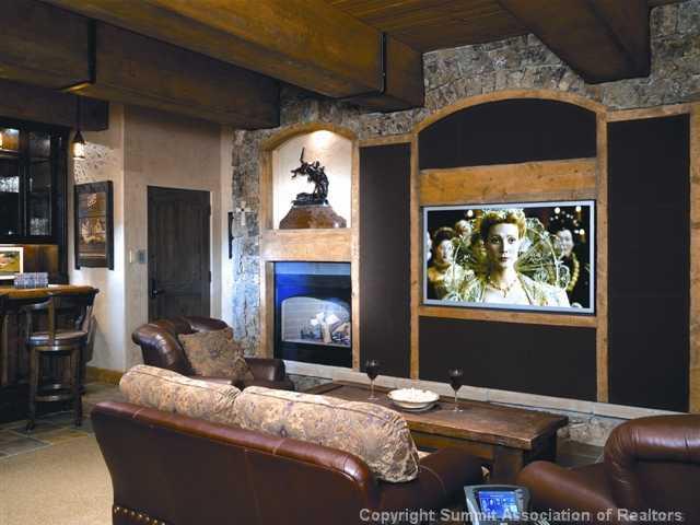 1060 4 O Clock Road Breckenridge, CO 80424 - Photo 6 of 12 a outdoor living space with furniture and a fireplace