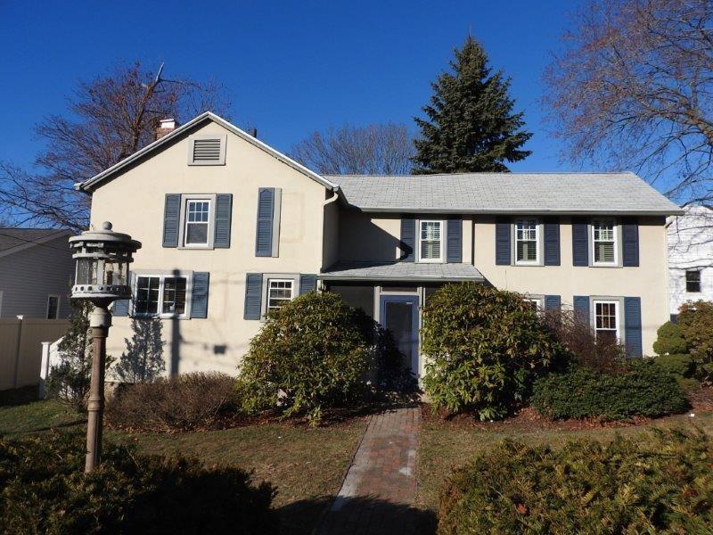 645 Ridge Road Middletown, CT 06457 - Photo 1 of 1 a front view of a house with a yard