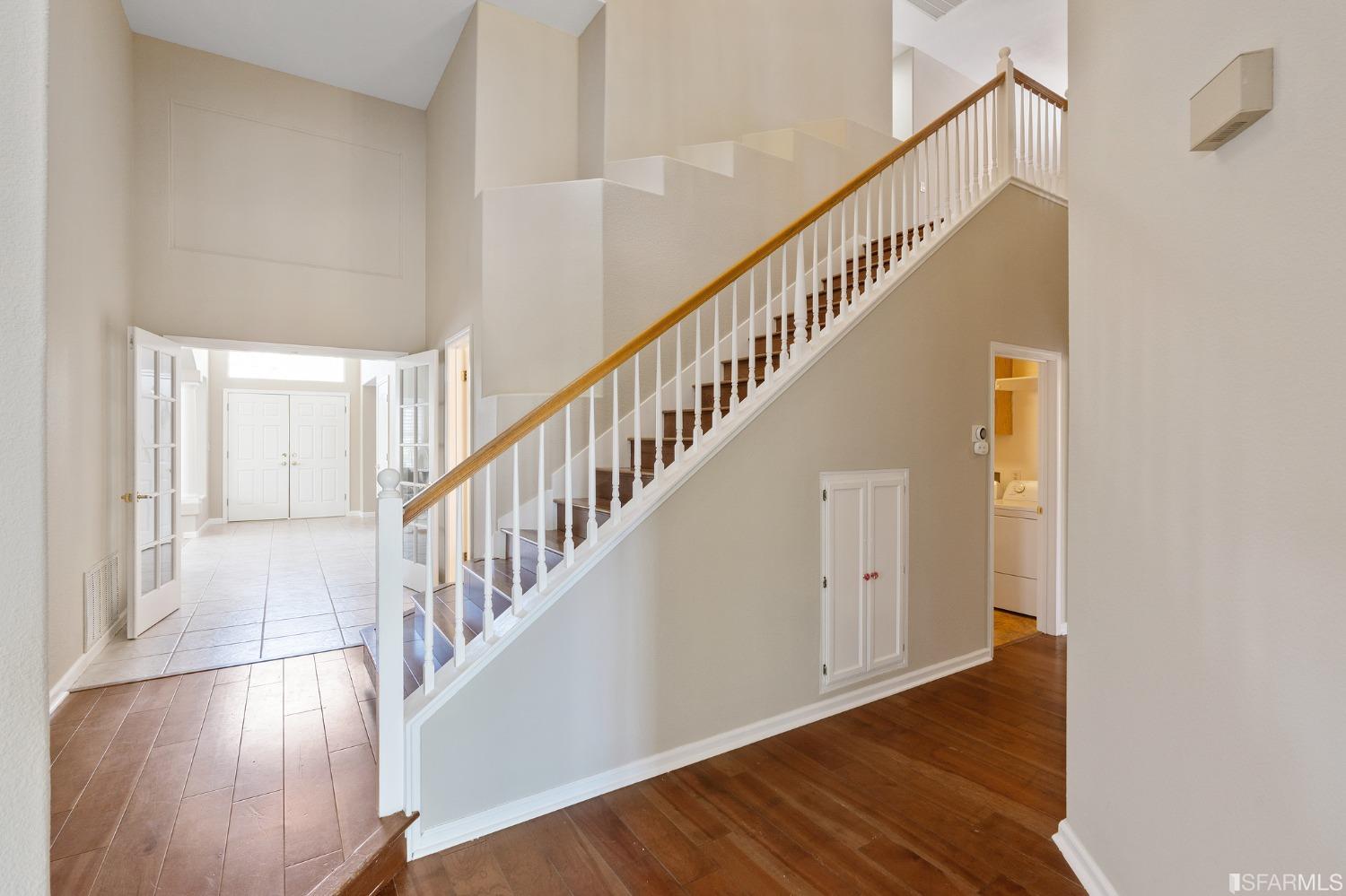 1359 Oak Crest Way Antioch, CA 94531 - Photo 26 of 65 a view of staircase with wooden floor and white walls