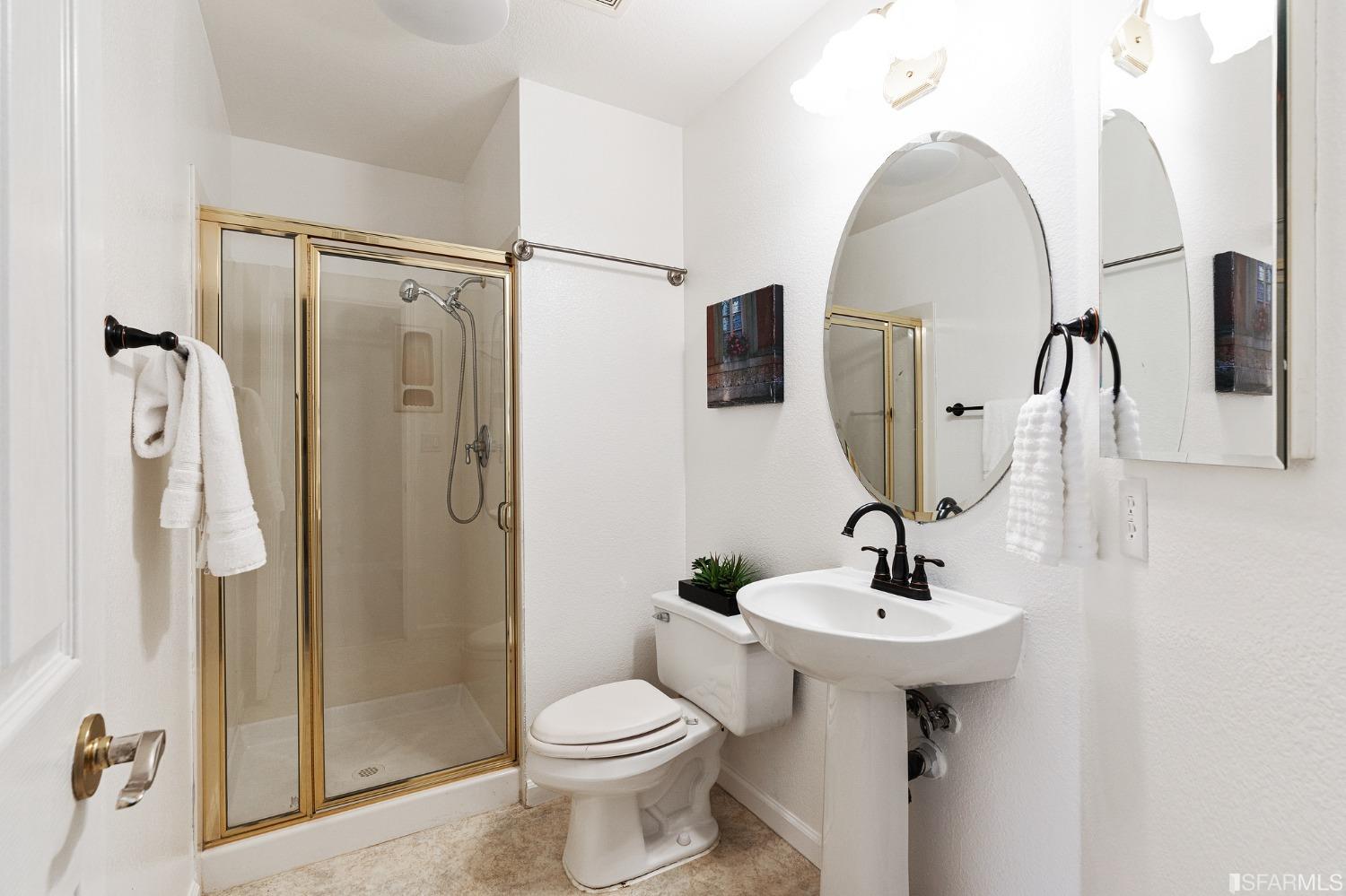 1359 Oak Crest Way Antioch, CA 94531 - Photo 38 of 65 a bathroom with a sink toilet and shower