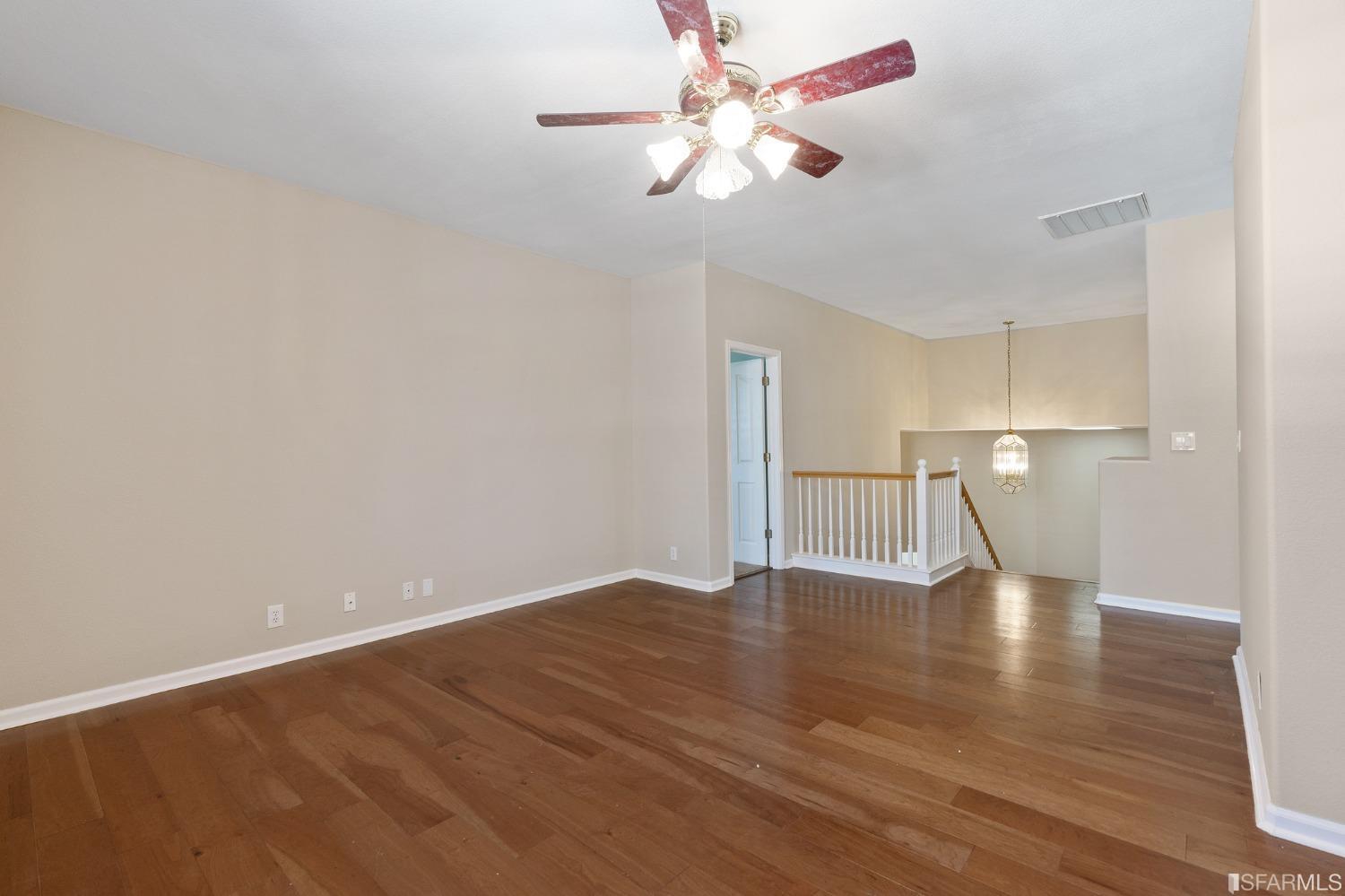1359 Oak Crest Way Antioch, CA 94531 - Photo 40 of 65 a view of an empty room with wooden floor