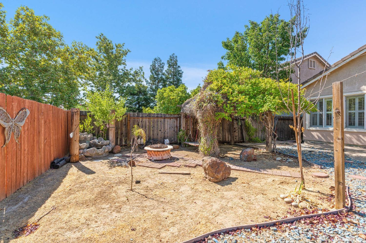 1359 Oak Crest Way Antioch, CA 94531 - Photo 60 of 65 a view of a backyard with plants and tree