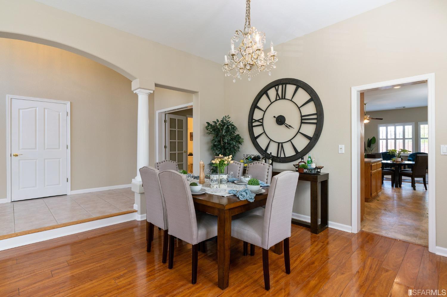 1359 Oak Crest Way Antioch, CA 94531 - Photo 10 of 65 a view of a dining room with furniture a chandelier and wooden floor