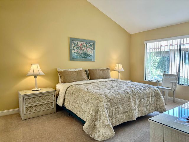 a bathroom with a double vanity sink and mirror