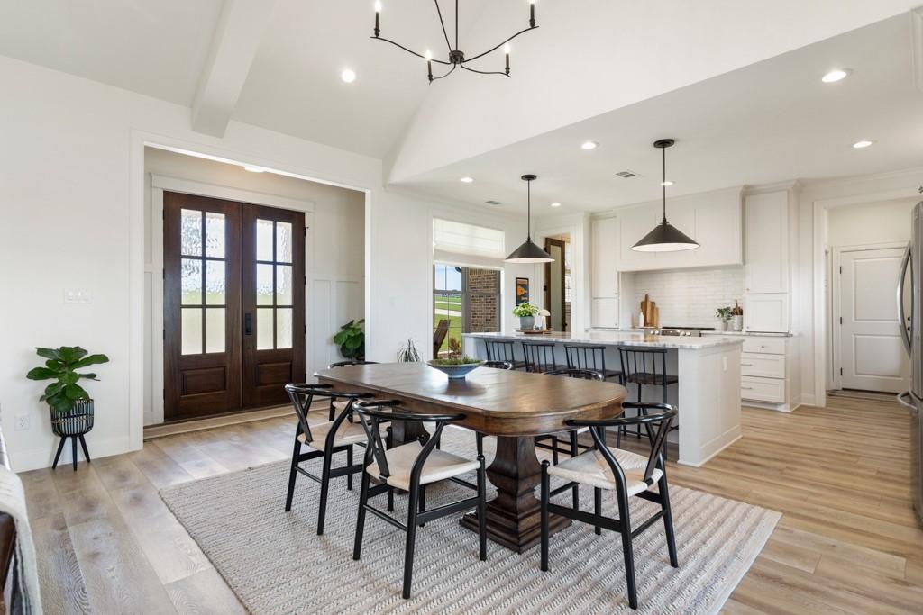 23630 Champion Drive Lindale, TX 75771 - Photo 7 of 36 a dining room with furniture and window