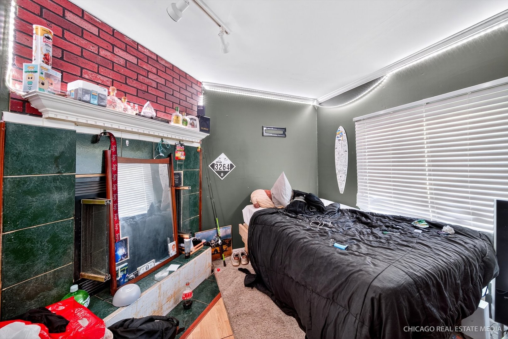 135 Springleaf Drive Bolingbrook, IL 60440 - Photo 4 of 16 a bed sitting in a bedroom next to a window