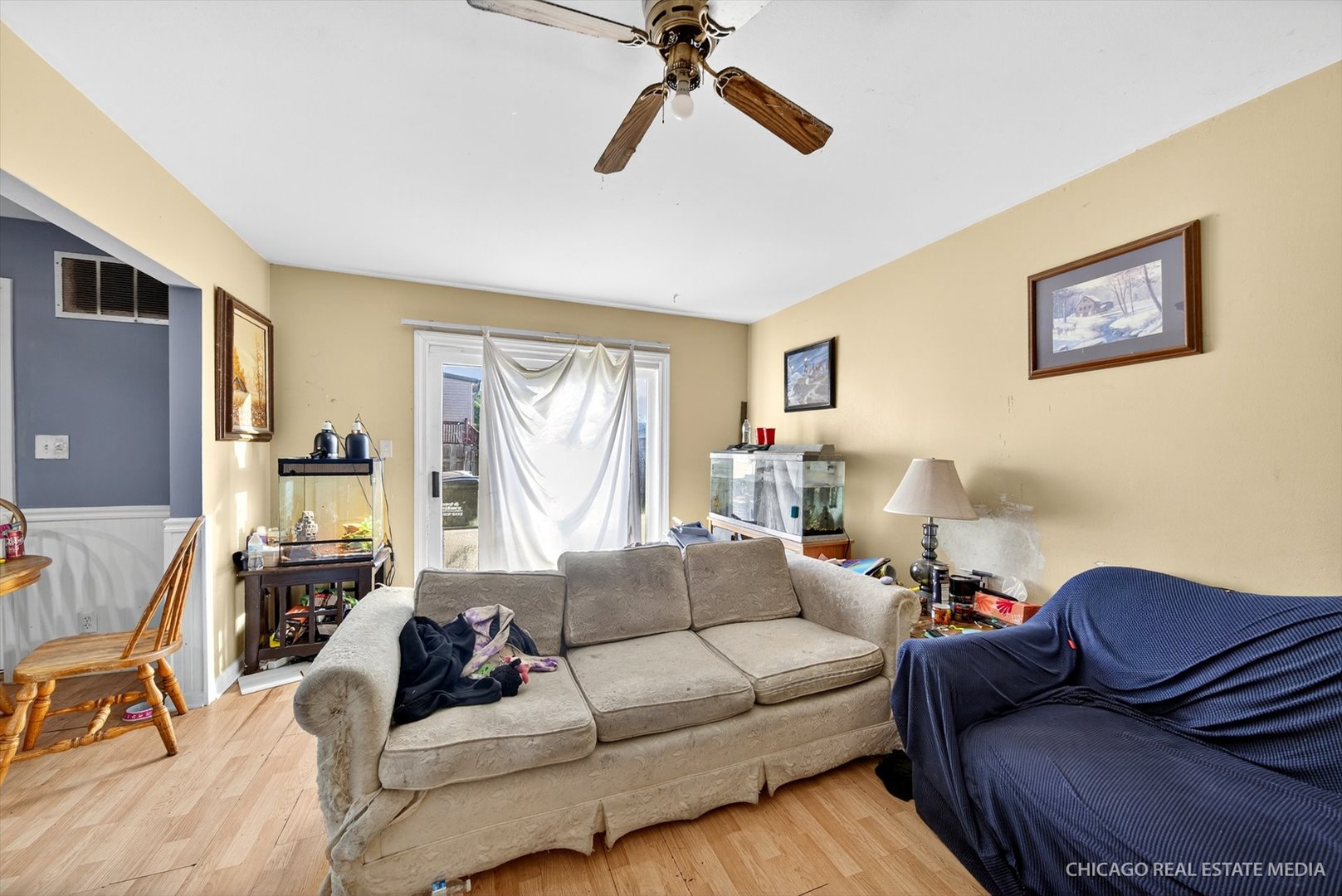 135 Springleaf Drive Bolingbrook, IL 60440 - Photo 8 of 16 a living room with furniture and a window