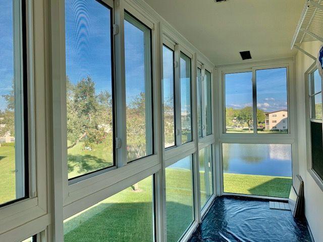 74 Fanshaw B Boca Raton, FL 33434 - Photo 12 of 22 Sliding Windows on Patio w/Lake View
