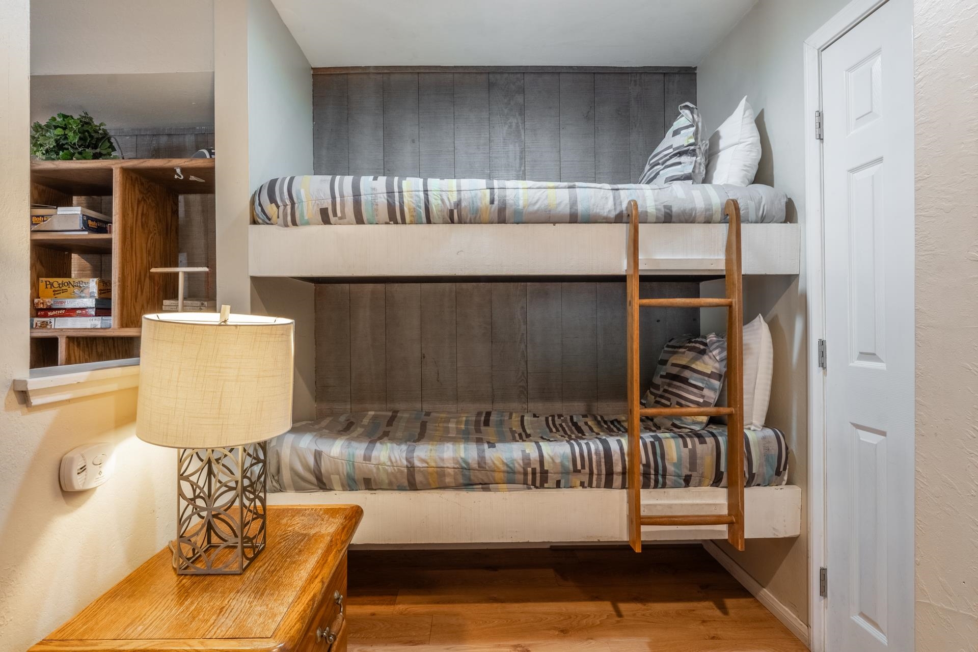 2113 Meridian Boulevard, Unit 141 Mammoth Lakes, CA 93546 - Photo 15 of 23 Bedroom featuring light wood-style flooring