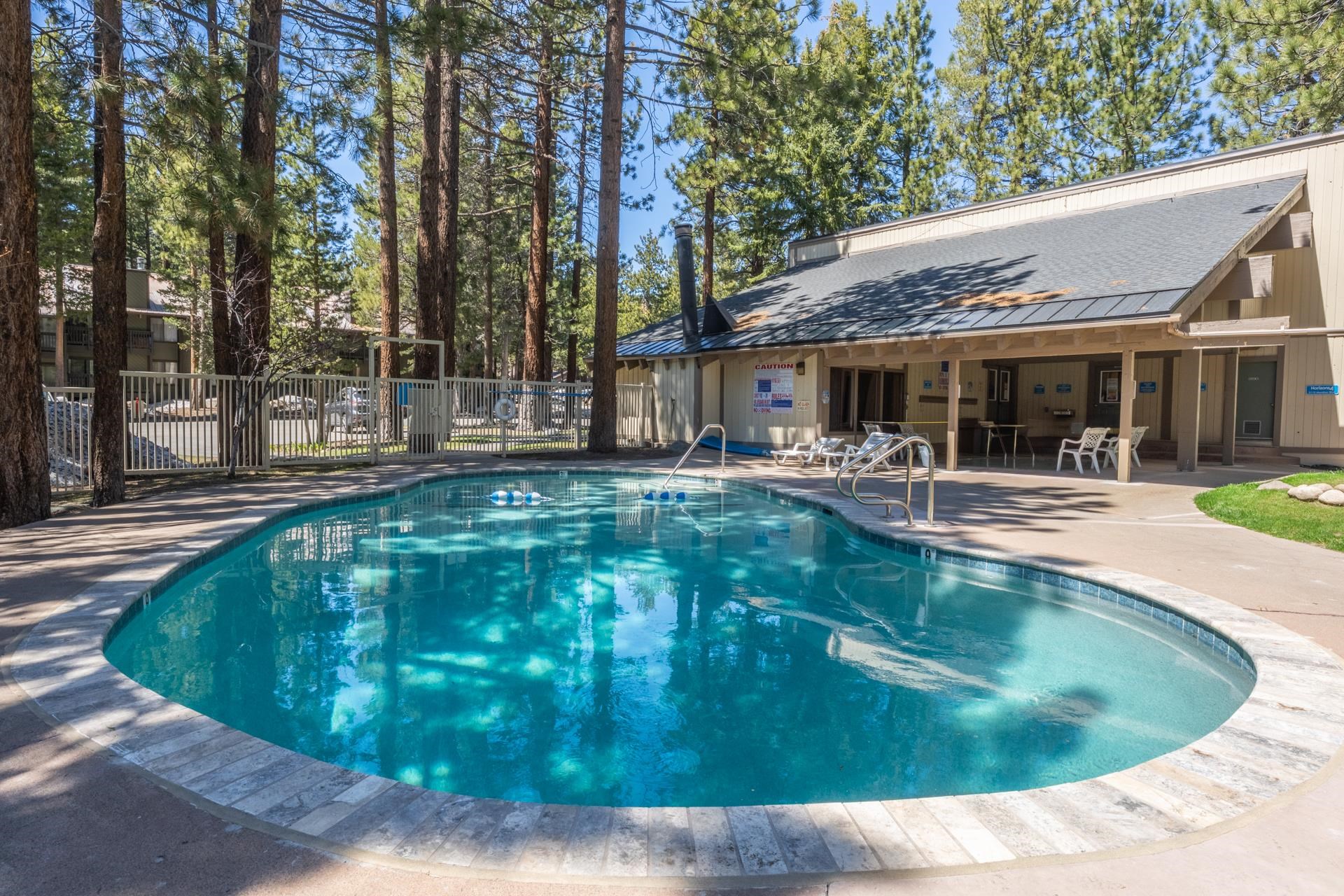 2113 Meridian Boulevard, Unit 141 Mammoth Lakes, CA 93546 - Photo 20 of 23 Community pool featuring a patio